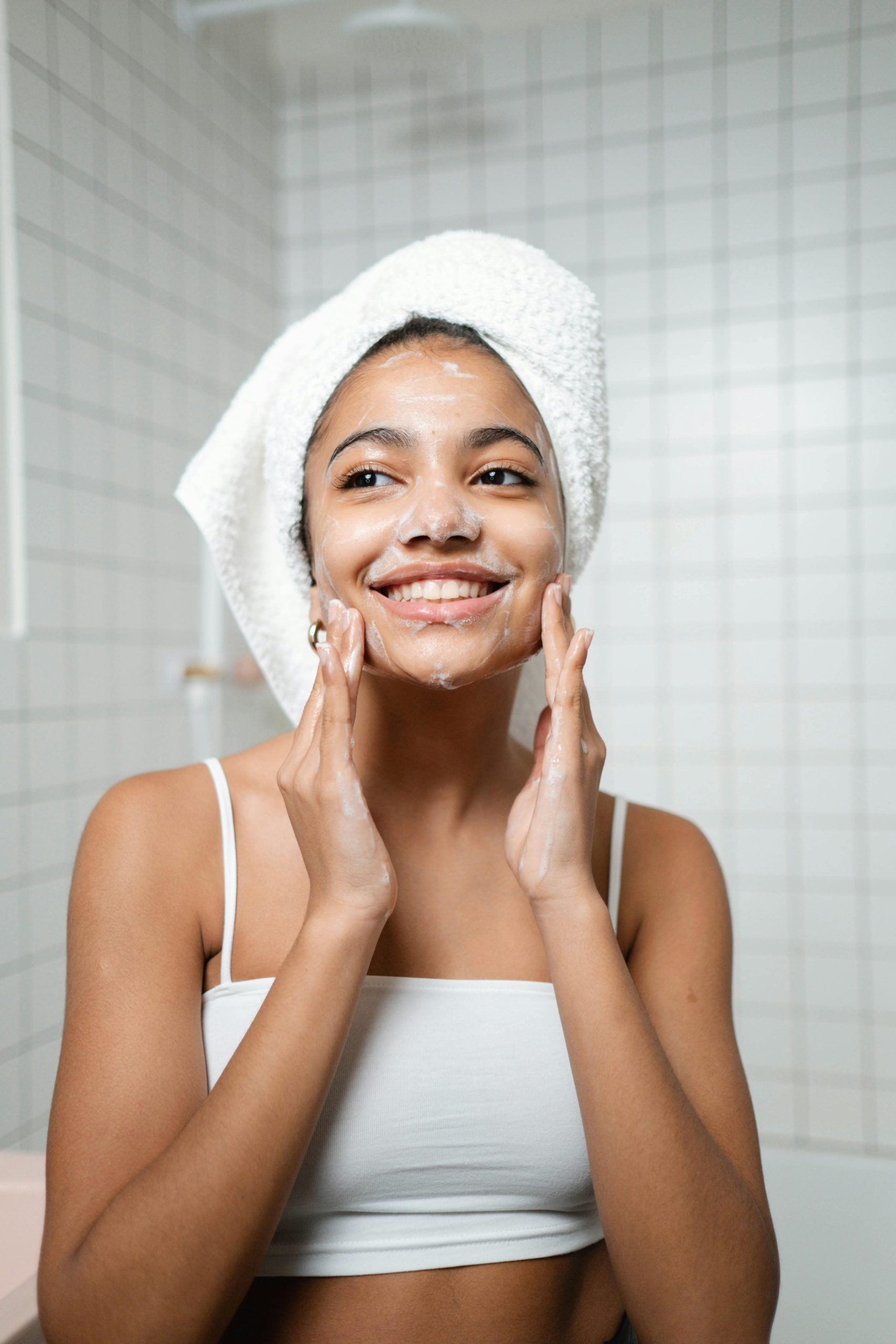 Photo by Ron Lach : https://www.pexels.com/photo/woman-washing-her-face-8142196/