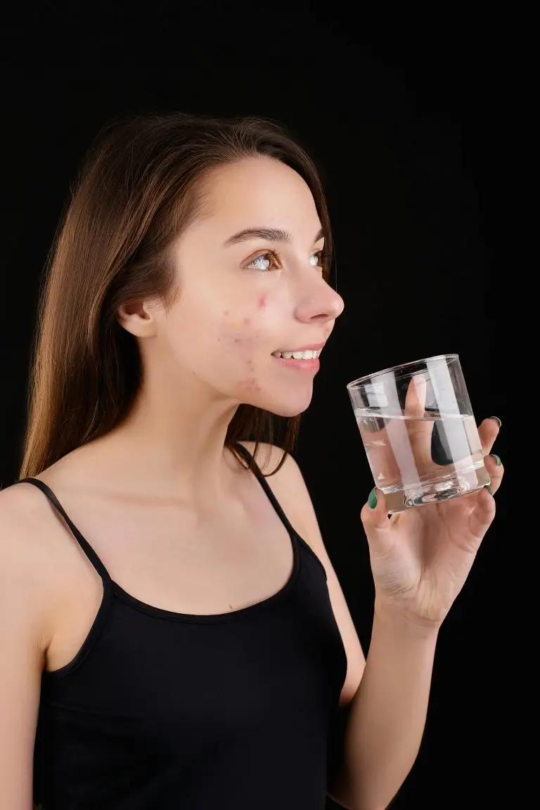 Photo by Anna Nekrashevich: https://www.pexels.com/photo/a-smiling-teenager-holding-a-glass-of-water-6476071/