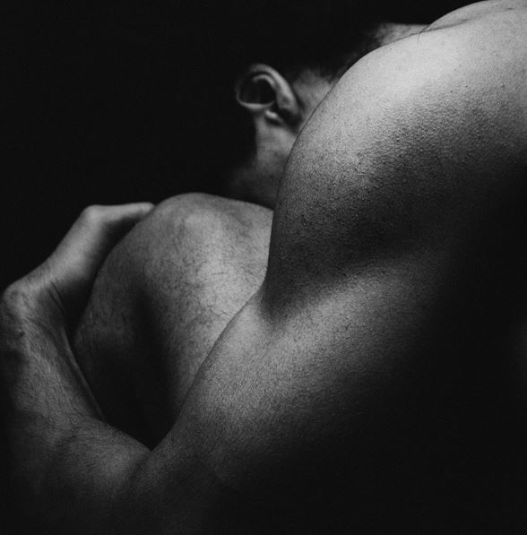 Photo by Y O U S E F M O R S I: https://www.pexels.com/photo/black-and-white-photo-of-muscular-back-of-a-man-20863894/